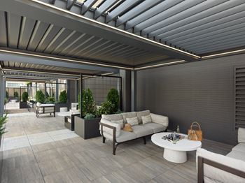 A patio with a white couch 